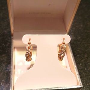 Rose gold hoop earrings with crystals